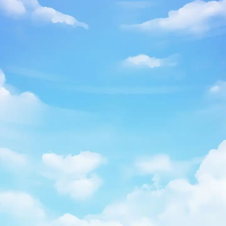 Bright blue sky with small white clouds