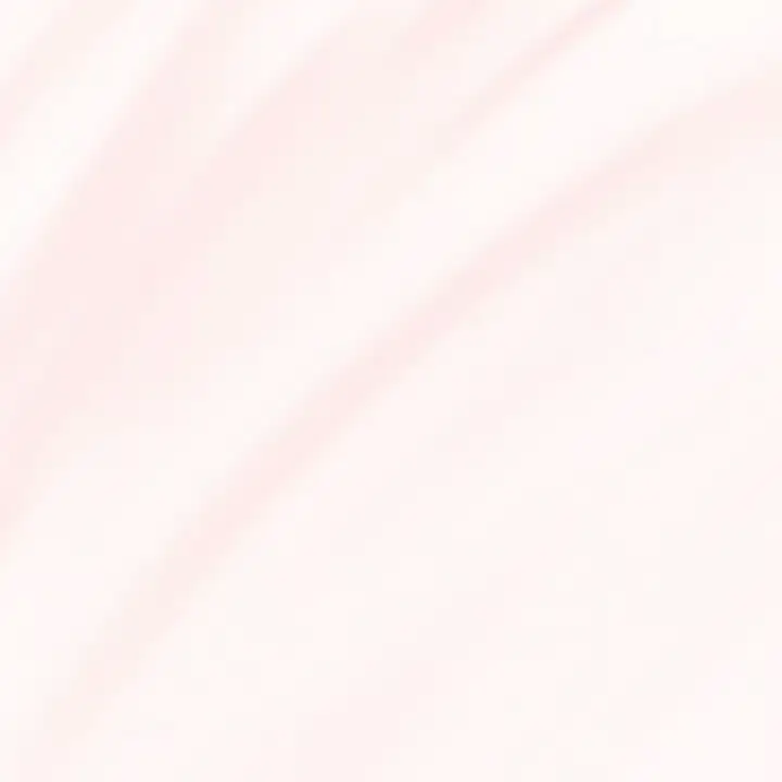 Pale pink veins running through white marble