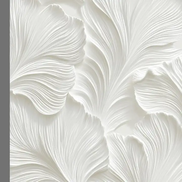 Leaf shapes carved in relief into white