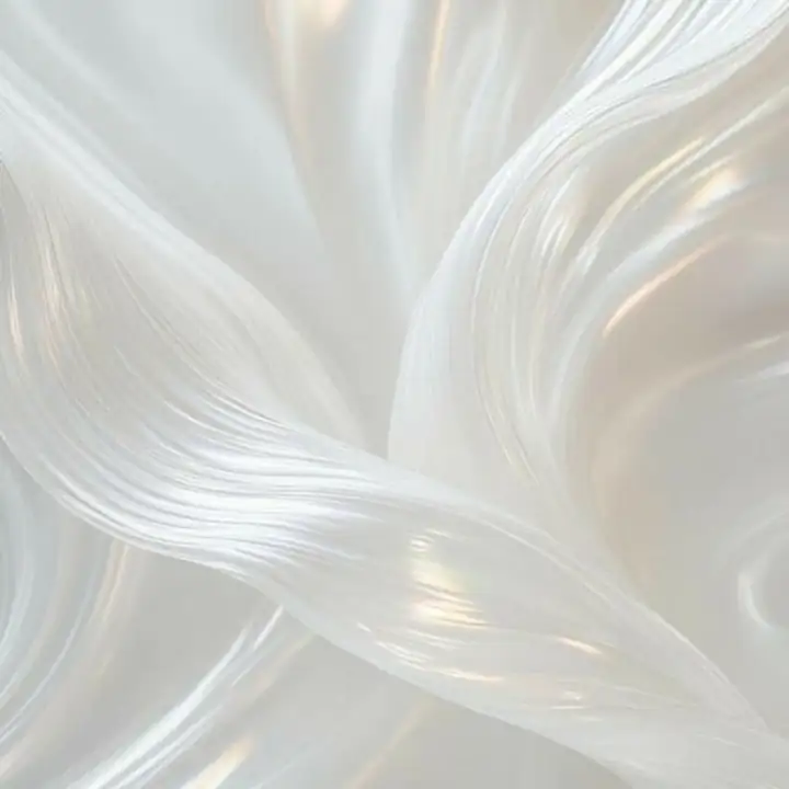 Strands of white silk lying loosely together